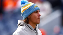 Justin Herbert #10 of the Los Angeles Chargers looks on prior to a game against the Denver Broncos at Empower Field At Mile High on December 31, 2023 in Denver, Colorado.