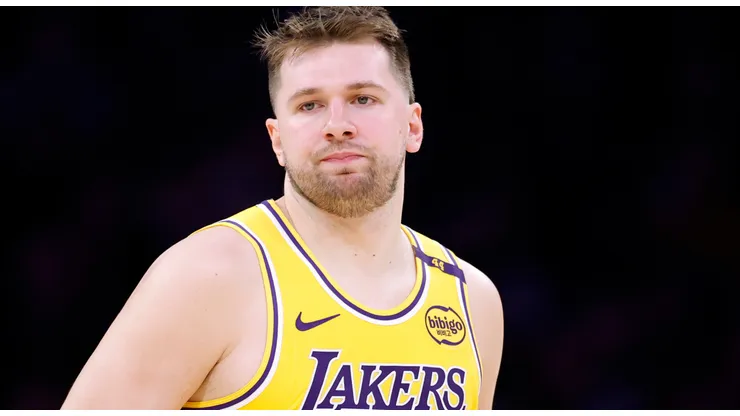 Luka Doncic #77 of the Los Angeles Lakers dribbles during an NBA game.
