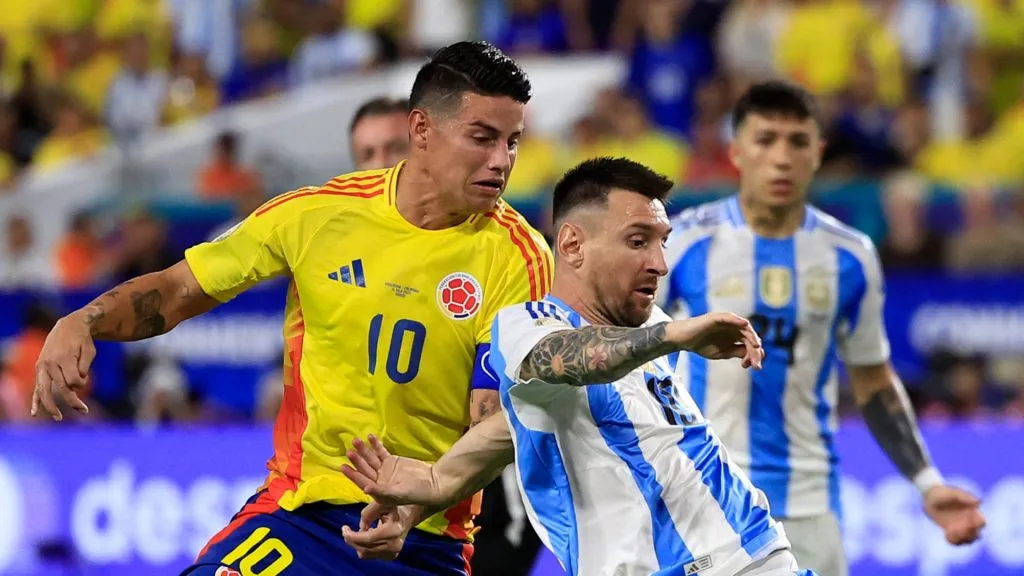 James Rodriguez of Colombia battles for possession with Lionel Messi of Argentina during the CONMEBOL Copa America 2024 Final match between Argentina and Colombia at Hard Rock Stadium on July 14, 2024 in Miami Gardens, Florida.
