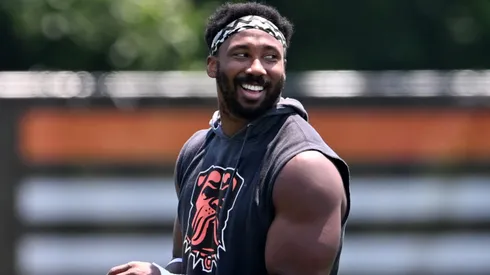 Myles Garrett #95 and Shelby Harris #93 of the Cleveland Browns walk off the field after Cleveland Browns mandatory minicamp at CrossCountry Mortgage Campus on June 11, 2025 in Berea, Ohio.