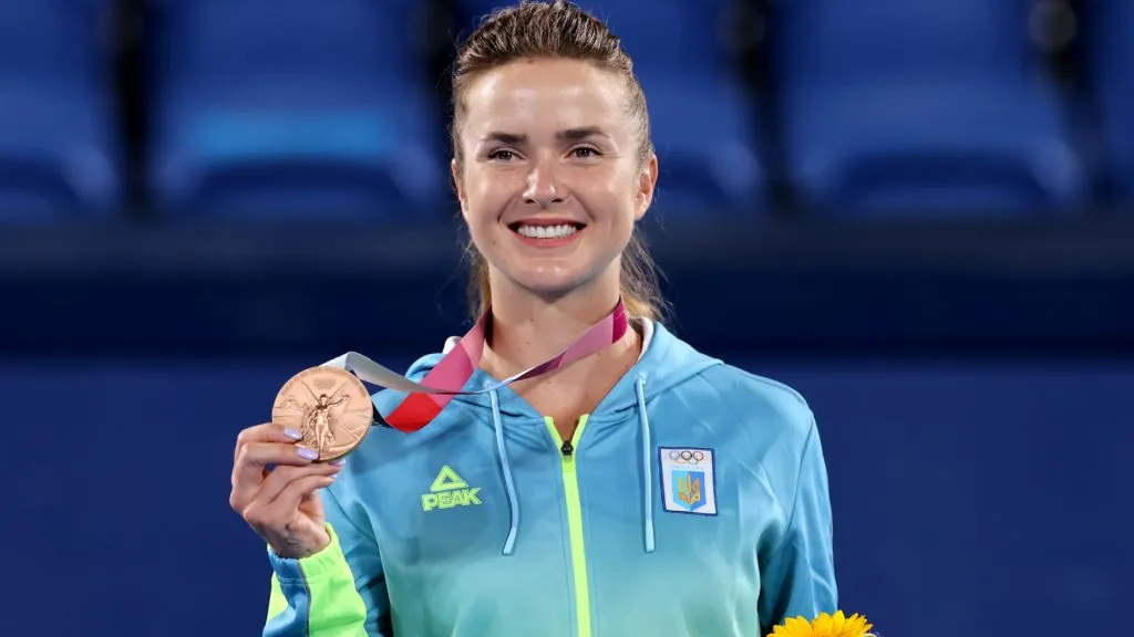 Elina Svitolina of Team Ukraine smiles with her bronze medal on the podium during the medal ceremony in Tokyo 2020 Olympics. (Clive Brunskill/Getty Images)
