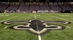 An interior view of the field showing the New Orleans Saints logo.
