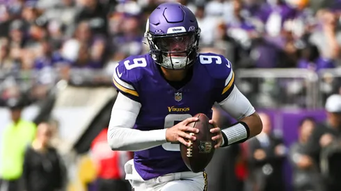 J.J. McCarthy #9 of the Minnesota Vikings carries the ball in the second quarter of the preseason game against the Las Vegas Raiders at U.S. Bank Stadium on August 10, 2024 in Minneapolis, Minnesota