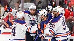 Leon Draisaitl #29 of the Edmonton Oilers celebrates with teammates after scoring during overtime to beat the Florida Panthers 5-4 in Game Four of the 2025 Stanley Cup Final at Amerant Bank Arena on June 12, 2025 in Sunrise, Florida.