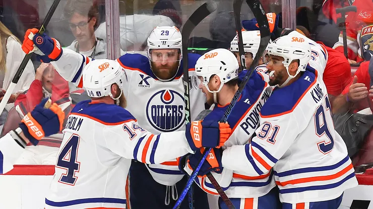 Leon Draisaitl #29 of the Edmonton Oilers celebrates with teammates after scoring during overtime to beat the Florida Panthers 5-4 in Game Four of the 2025 Stanley Cup Final at Amerant Bank Arena on June 12, 2025 in Sunrise, Florida.