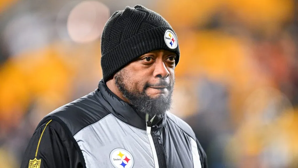 Mike Tomlin watching carefully during a game in cold weather