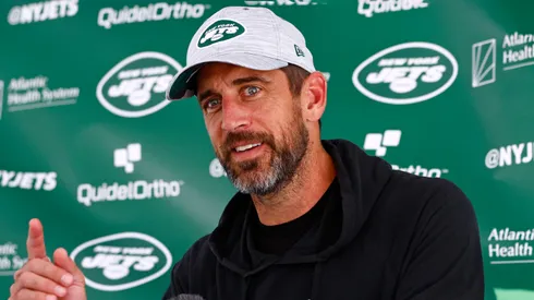 Quarterback Aaron Rodgers #8 of the New York Jets talks to reporters after training camp at Atlantic Health Jets Training Center on July 26, 2023 in Florham Park, New Jersey.