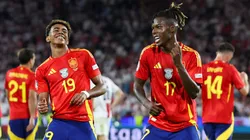 Nico Williams of Spain celebrates scoring his team's third goal with teammate Lamine Yamal during the UEFA EURO 2024 round of 16 match between Spain and Georgia at Cologne Stadium on June 30, 2024 in Cologne, Germany.