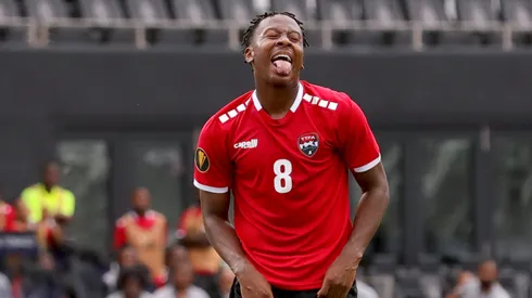 Ajani Fortune #8 of Trinidad and Tobago reacts during the second half of the game tts and Nevis at DRV PNK Stadium on June 25, 2023 in Fort Lauderdale, Florida.