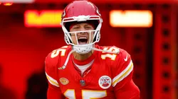 Patrick Mahomes #15 of the Kansas City Chiefs runs onto the field before the game against the Cincinnati Bengals at GEHA Field at Arrowhead Stadium on December 31, 2023 in Kansas City, Missouri.