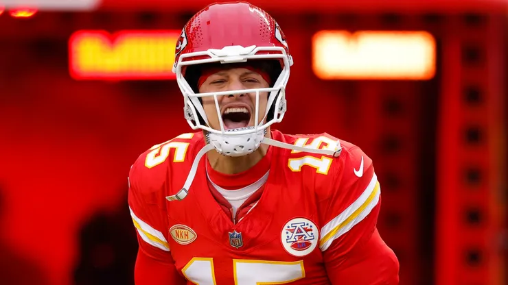 Patrick Mahomes #15 of the Kansas City Chiefs runs onto the field before the game against the Cincinnati Bengals at GEHA Field at Arrowhead Stadium on December 31, 2023 in Kansas City, Missouri.