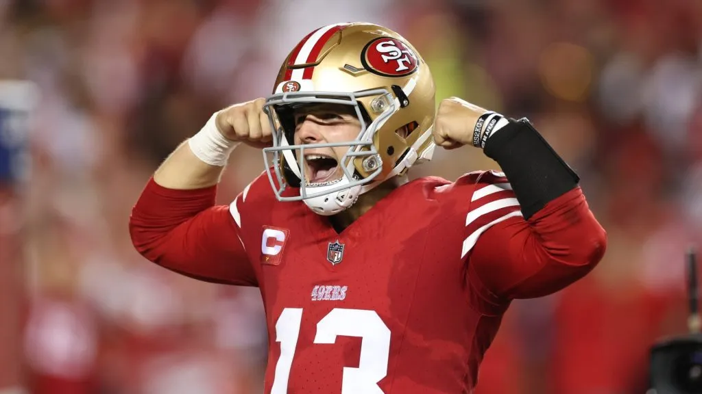 Brock Purdy #13 of the San Francisco 49ers celebrates a touchdown