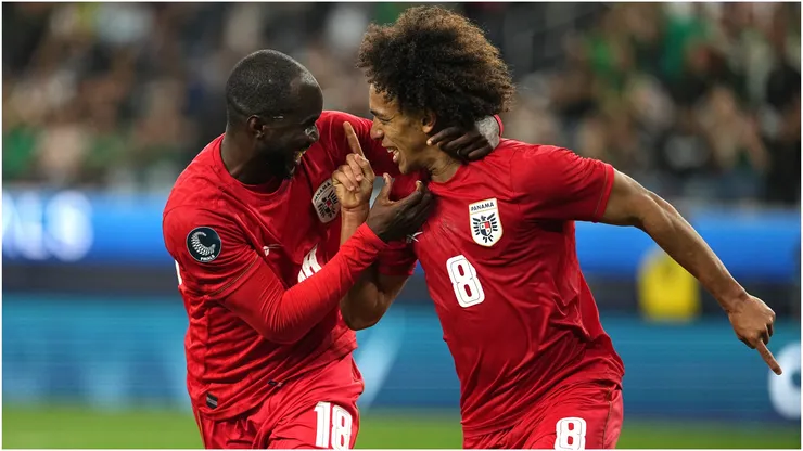 Adalberto Carrasquilla (R) of Panama celebrates with his teammate Cecilio Waterman.