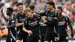 Martin Odegaard of Arsenal celebrates scoring his team's second goal with teammates during the Premier League match between Southampton FC and Arsenal FC at St Mary's Stadium on May 25, 2025 in Southampton, England.