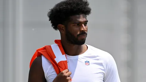 Shedeur Sanders #12 of the Cleveland Browns walks off the field after Cleveland Browns OTA offseason workouts at CrossCountry Mortgage Campus on June 04, 2025 in Berea, Ohio.