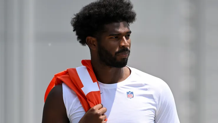Shedeur Sanders #12 of the Cleveland Browns walks off the field after Cleveland Browns OTA offseason workouts at CrossCountry Mortgage Campus on June 04, 2025 in Berea, Ohio.