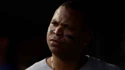 Rafael Devers #11 of the Boston Red Sox looks on from the dugout during the first inning against the New York Yankees at Yankee Stadium on June 08, 2025 in New York City.