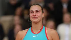 Aryna Sabalenka reacts during the 2025 Roland Garros trophy ceremony