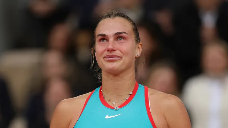 Aryna Sabalenka reacts during the 2025 Roland Garros trophy ceremony