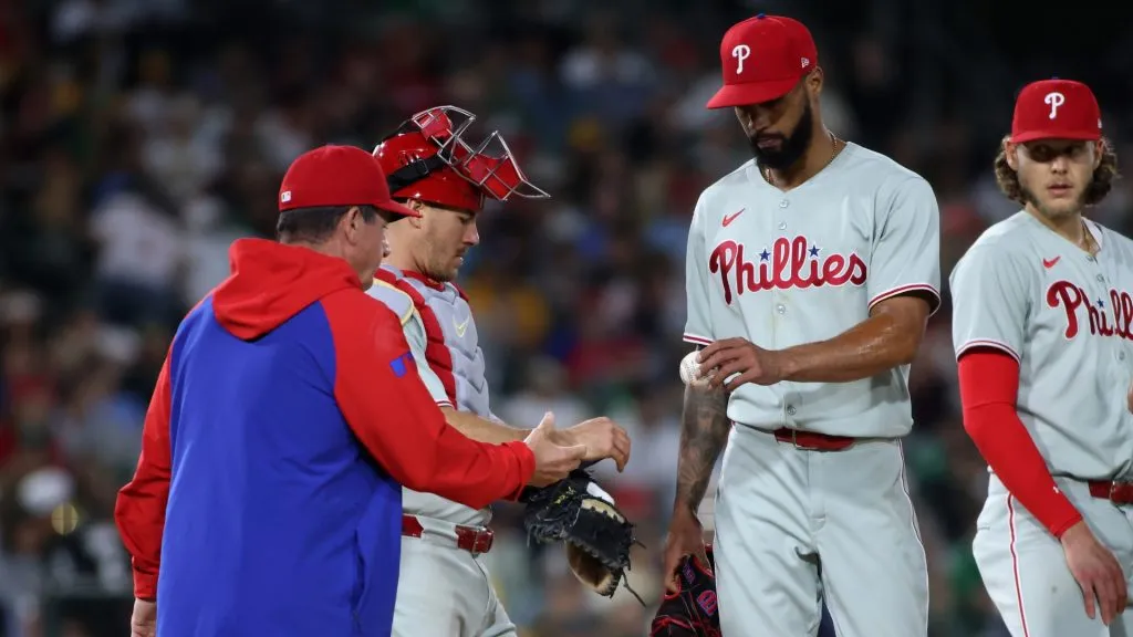 Cristopher Sánchez #61 of the Philadelphia Phillies is taken out of the game by manager Rob Thomson #59 during the fifth inning against the Athletics at Sutter Health Park on May 24, 2025 in Sacramento, California. (Photo by Scott Marshall/Getty Images)
