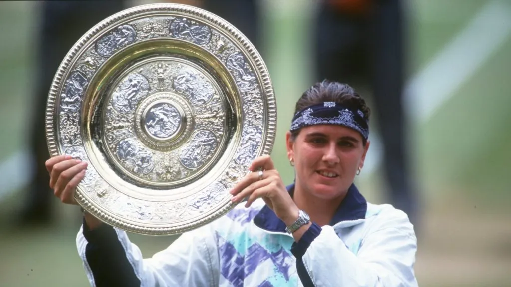 Conchita Martinez after defeating Martina Navratilova at the 1994 Wimbledon final. (Bob Martin/ALLSPORT/Getty Images)
