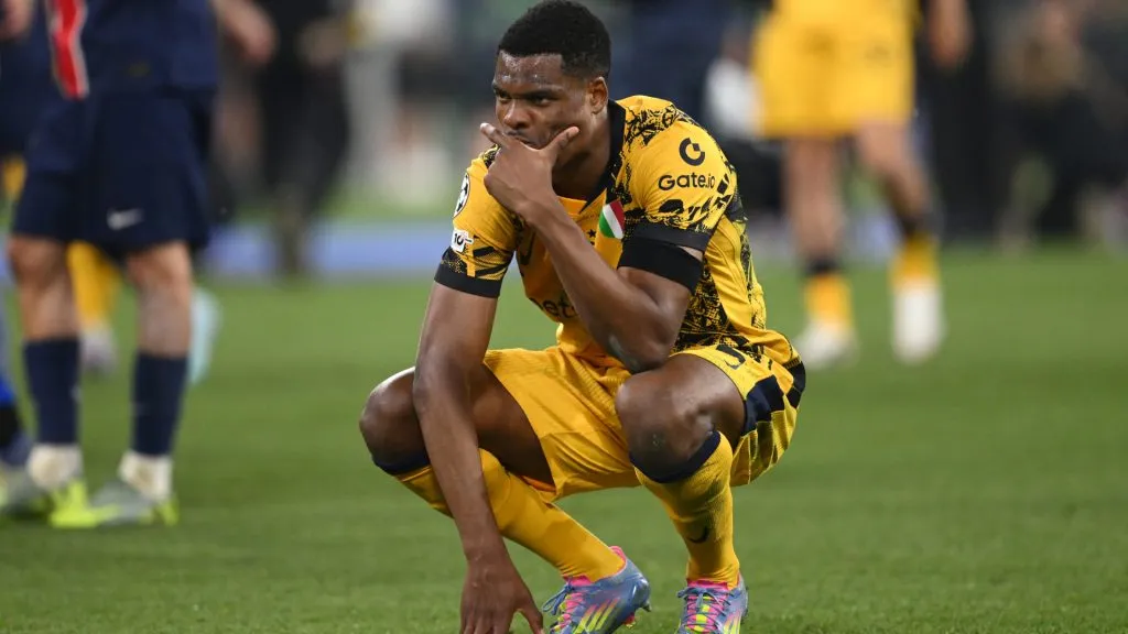 Denzel Dumfries reacts dejectedly after the UEFA Champions League Final 2025 between Paris Saint-Germain and FC Inter. (Stu Forster/Getty Images)