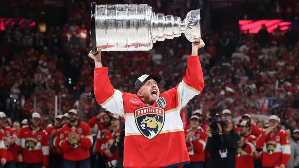 Nate Schmidt #88 of the Florida Panthers celebrates with the Stanley Cup after defeating the Edmonton Oilers in Game Six of the 2025 Stanley Cup Final. (Source: Christian Petersen/Getty Images)