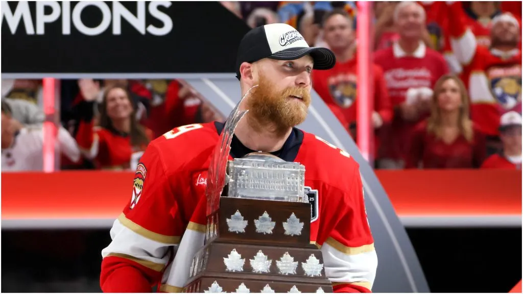 Sam Bennett #9 of the Florida Panthers celebrates with the Conn Smythe Trophy after defeating the Edmonton Oilers in Game Six of the 2025 Stanley Cup Final at Amerant Bank Arena on June 17, 2025 in Sunrise, Florida.