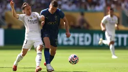 Luka Modric #10 of Real Madrid C.F. battles for possession with Sergej Milinkovic-Savic #22 of Al Hilal during the FIFA Club World Cup 2025 group H match.
