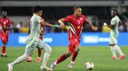 Liam van Gelderen #3 of Suriname is marked by Jesus Gallardo #23 of Mexico