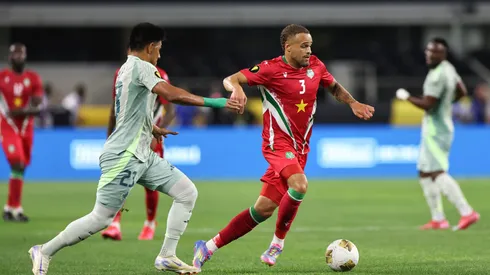 Liam van Gelderen #3 of Suriname is marked by Jesus Gallardo #23 of Mexico