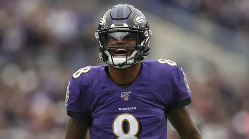 Quarterback Lamar Jackson #8 of the Baltimore Ravens reacts after throwing a touchdown pass to tight end Mark Andrews #89 of the Baltimore Ravens a against the Houston Texans during the second quarter at M&T Bank Stadium on November 17, 2019 in Baltimore, Maryland.