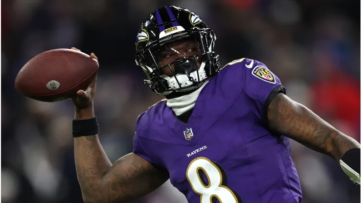 Quarterback Lamar Jackson #8 of the Baltimore Ravens passes the ball against the Houston Texans during the second quarter in the AFC Divisional Playoff game at M&T Bank Stadium on January 20, 2024 in Baltimore, Maryland.