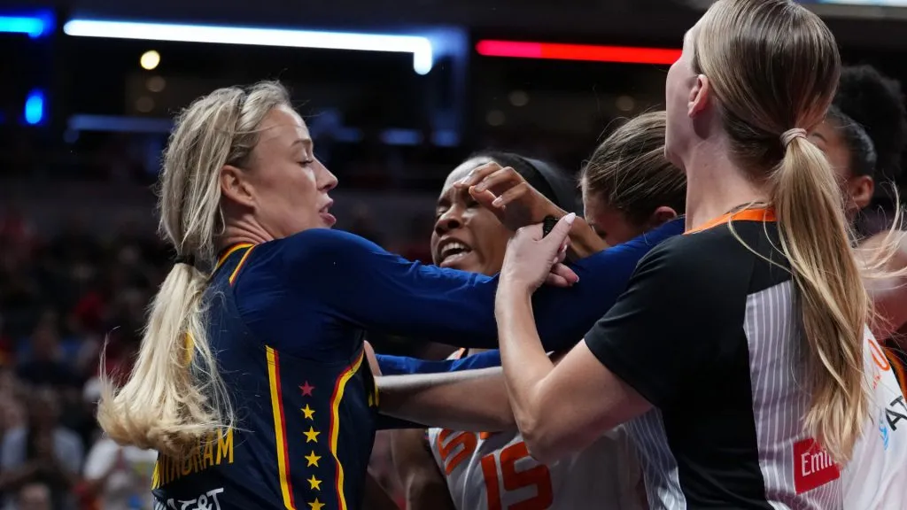 Sophie Cunningham #8 of the Indiana Fever and Jacy Sheldon #4 of the Connecticut Sun face off (Dylan Buell/Getty Images)