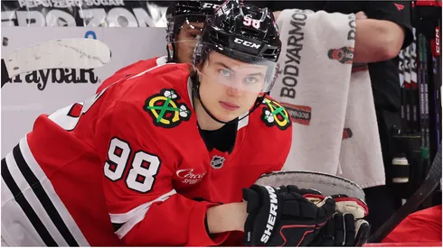 Connor Bedard #98 of the Chicago Blackhawks look on against the New York Rangers during the third period at the United Center on January 05, 2025 in Chicago, Illinois.