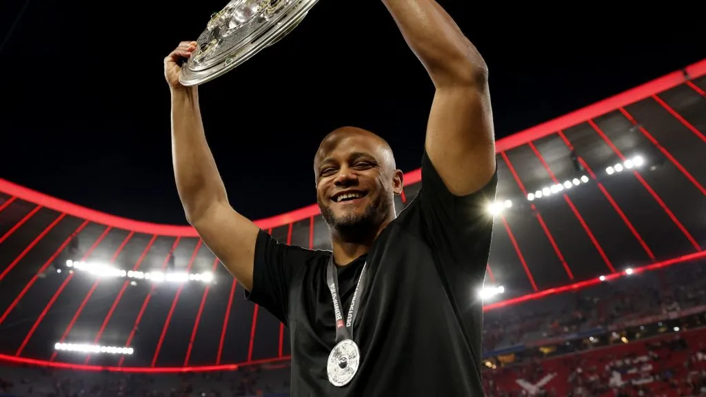 Vincent Kompany, Head Coach of Bayern Munich, celebrates with the Meisterschale trophy, after the teams 2-0 victory in the Bundesliga match in 2025. (Source: Alexander Hassenstein/Getty Images)