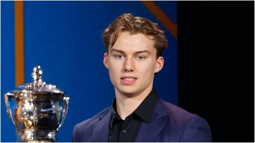 Connor Bedard holds the E. J. McGuire Award of Excellence during the 2023 NHL Awards at Bridgestone Arena on June 26, 2023 in Nashville, Tennessee.