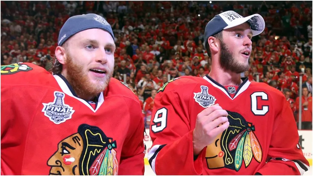 Patrick Kane #88 and Jonathan Toews #19 of the Chicago Blackhawks celebrate after defeating the Tampa Bay Lightning by a score of 2-0 in Game Six to win the 2015 NHL Stanley Cup Final at the United Center on June 15, 2015 in Chicago, Illinois.