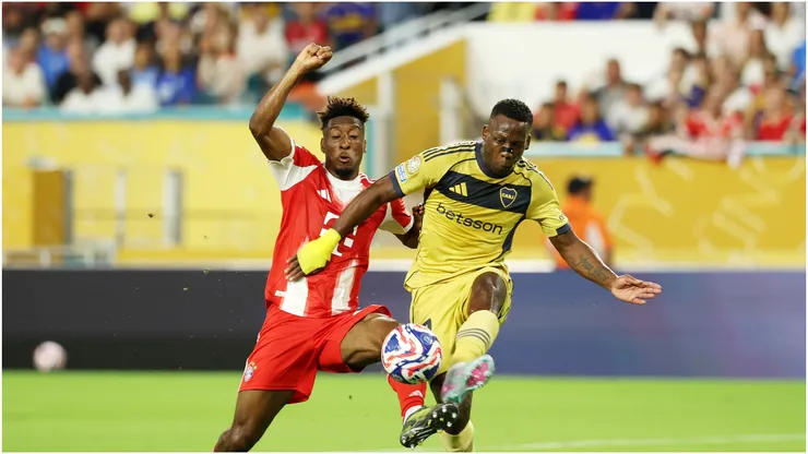Luis Advincula #17 of CA Boca Juniors is challenged by Kingsley Coman #11 of FC Bayern Munchen