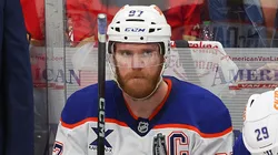 McDavid looks on from the bench during Game 6 of the Stanley Cup Final, reflecting a decade of leadership with the Oilers.