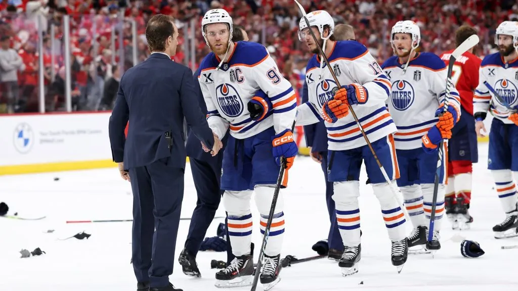 Connor McDavid #97 and Mattias Janmark #13 of the Edmonton Oilers react after being defeated by the Florida Panthers in Game Six of the 2025 Stanley Cup Final at Amerant Bank Arena on June 17, 2025 in Sunrise, Florida. (Photo by Christian Petersen/Getty Images)