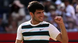 Carlos Alcaraz of Spain celebrates winning match point against Roberto Bautista Agut at Queen's Club.