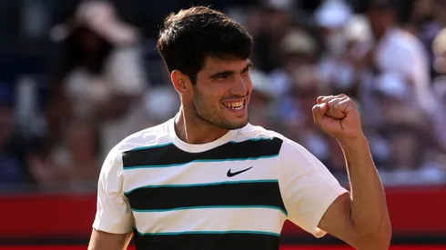 Carlos Alcaraz of Spain celebrates winning match point against Roberto Bautista Agut at Queen's Club.