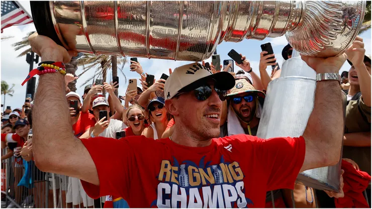 Brad Marchand lifting the Stanley Cup at the Panthers victory parade.