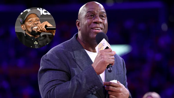 Kevin Durant and Magic Johnson speaks to the fans during the jersey retirement of Michael Cooper during halftime of the game between the Los Angeles Lakers and the San Antonio Spurs