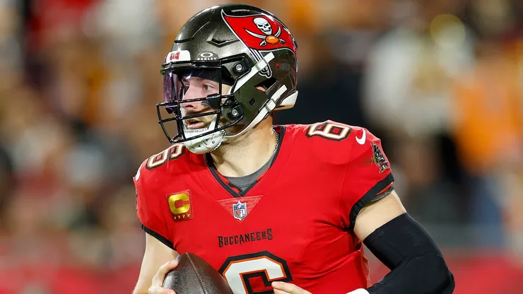 Baker Mayfield #6 of the Tampa Bay Buccaneers scrambles against the Washington Commanders.