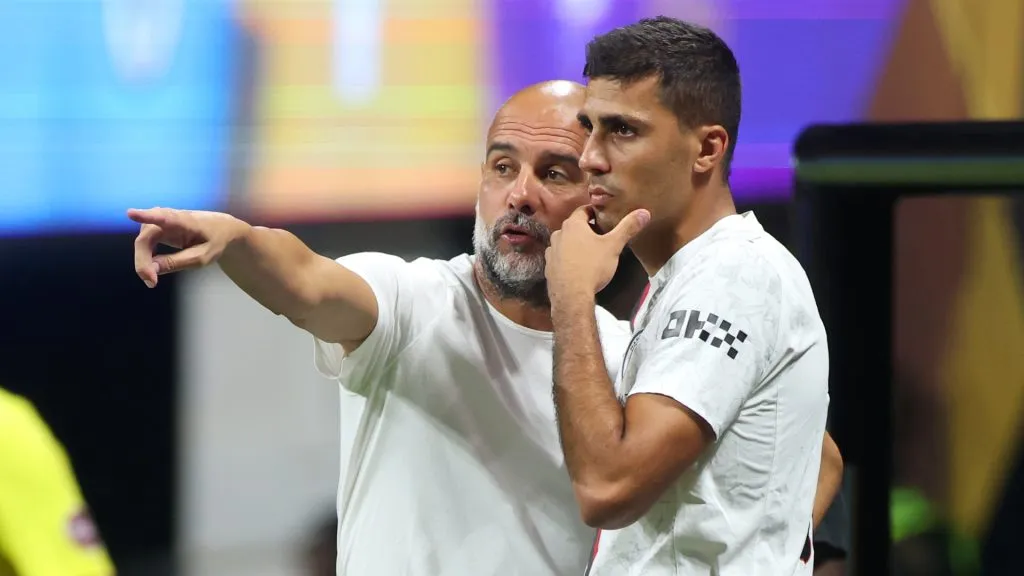Pep Guardiola, Head Coach of Manchester City, gives Rodri #16 instructions during the FIFA Club World Cup 2025 group G match between Manchester City FC and Al Ain FC on June 22. (Source: Alex Grimm/Getty Images)