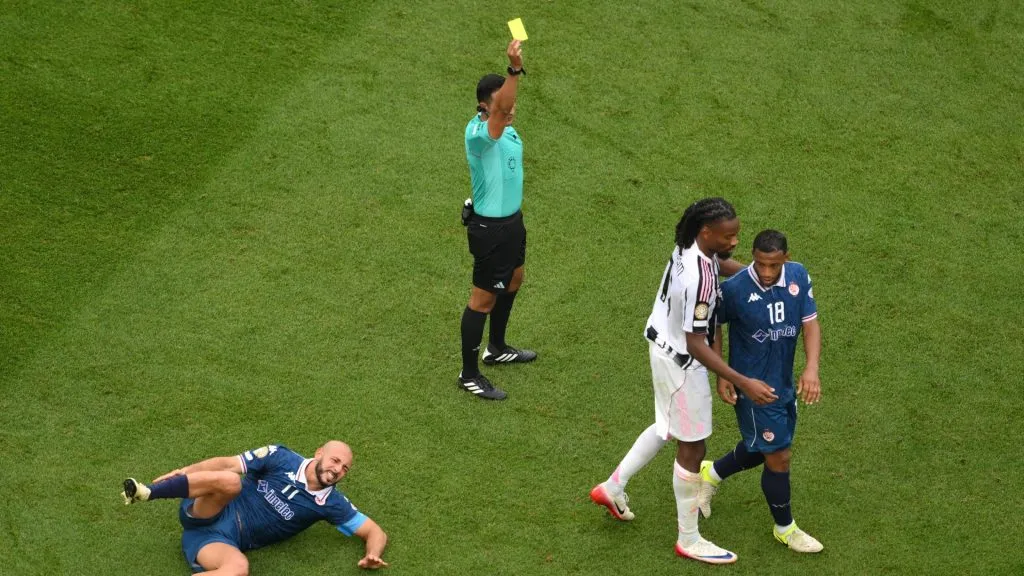 Khephren Thuram of Juventus FC is shown a yellow card by referee Said Martinez after a tackle on Nordin Amrabat of Wydad AC during the FIFA Club World Cup 2025 group G match. (Source: David Ramos/Getty Images)