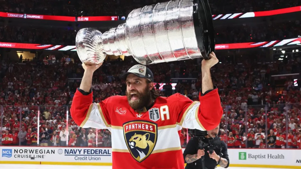 Aaron Ekblad #5 of the Florida Panthers celebrates with the Stanley Cup following the Cup win against the Edmonton Oilers in Game Six of the 2025 NHL Stanley Cup Final. (Source: Bruce Bennett/Getty Images)