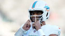 Tua Tagovailoa #1 of the Miami Dolphins looks on prior to the game against the New York Jets at MetLife Stadium on November 24, 2023 in East Rutherford, New Jersey.